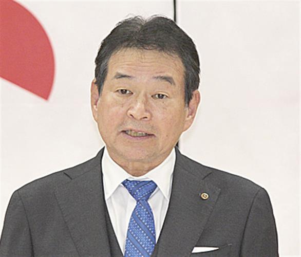 あいさつする長田会頭